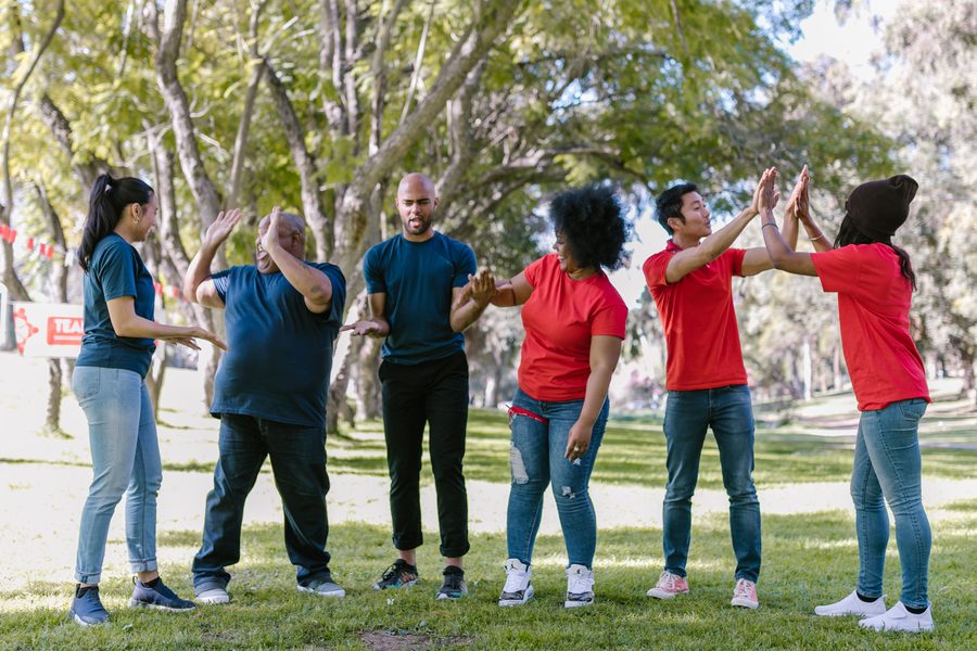 Team celebrating together at an outdoor session